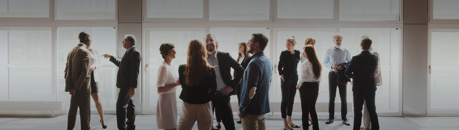 a group of people standing in a room