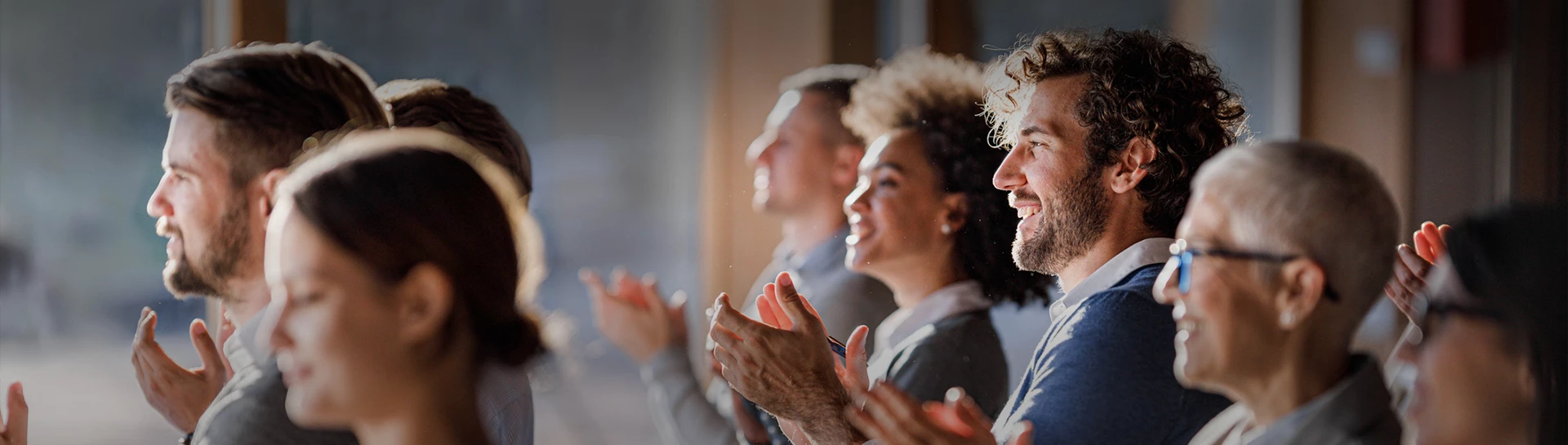 a group of people clapping
