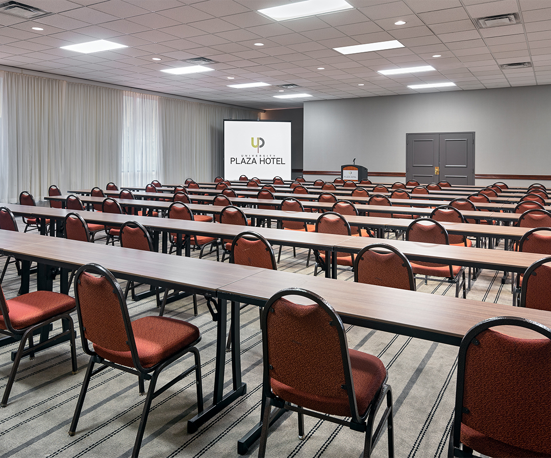 a room with tables and chairs