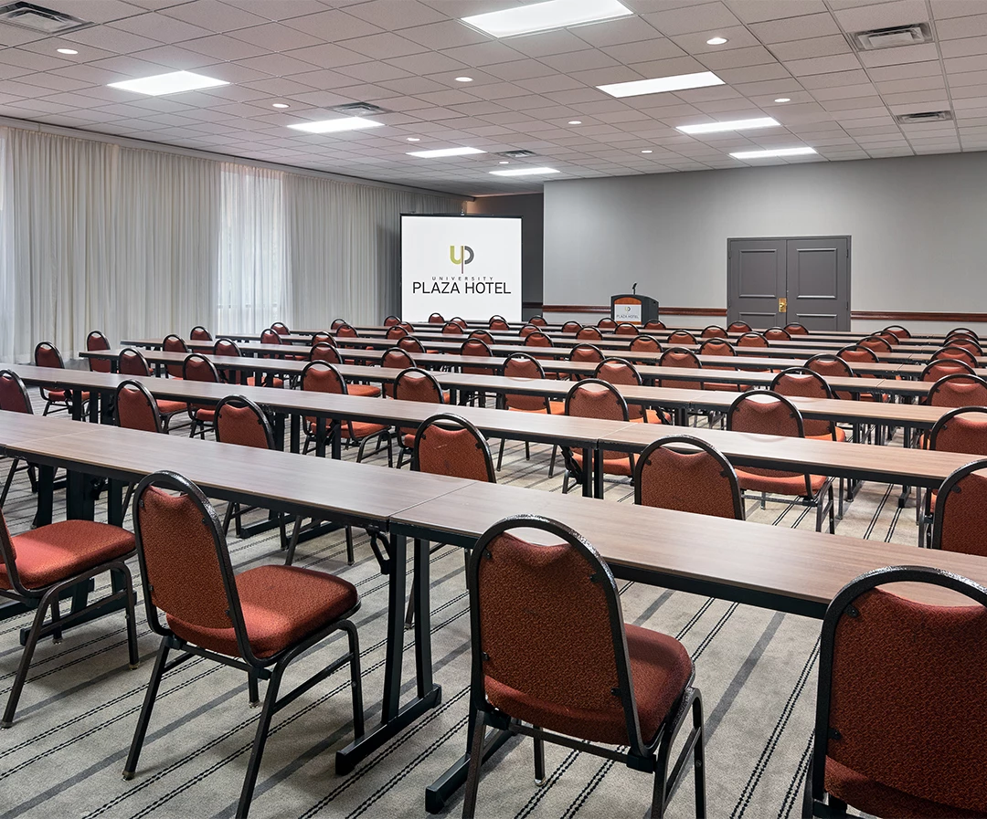 a room with tables and chairs