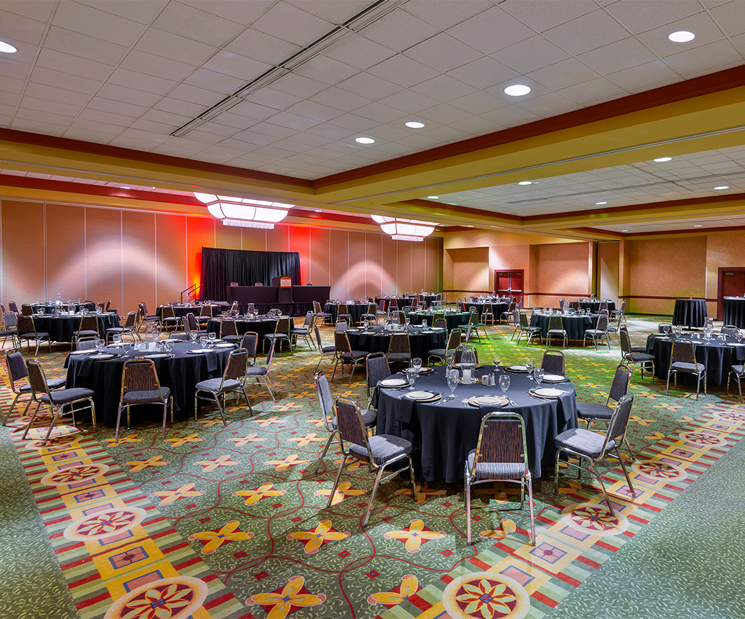 a large room with tables and chairs