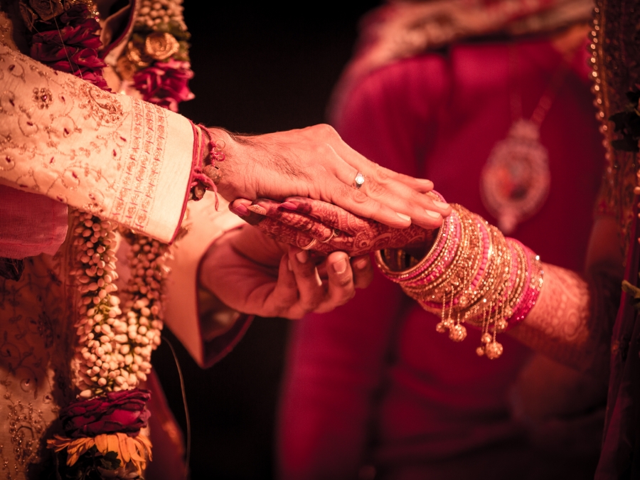 a man and woman holding hands