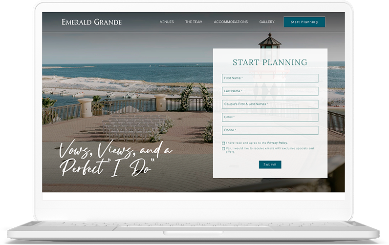 a laptop with a screen showing a beach and a building