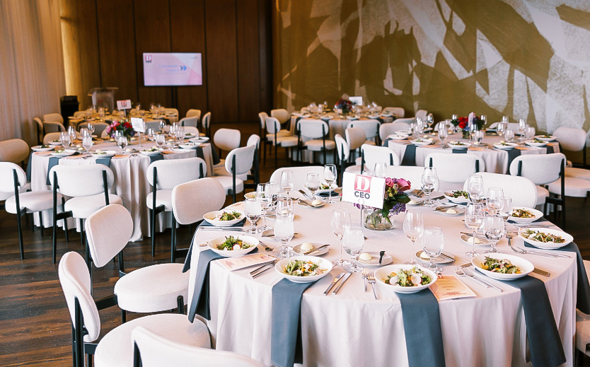 a group of tables set up for a banquet