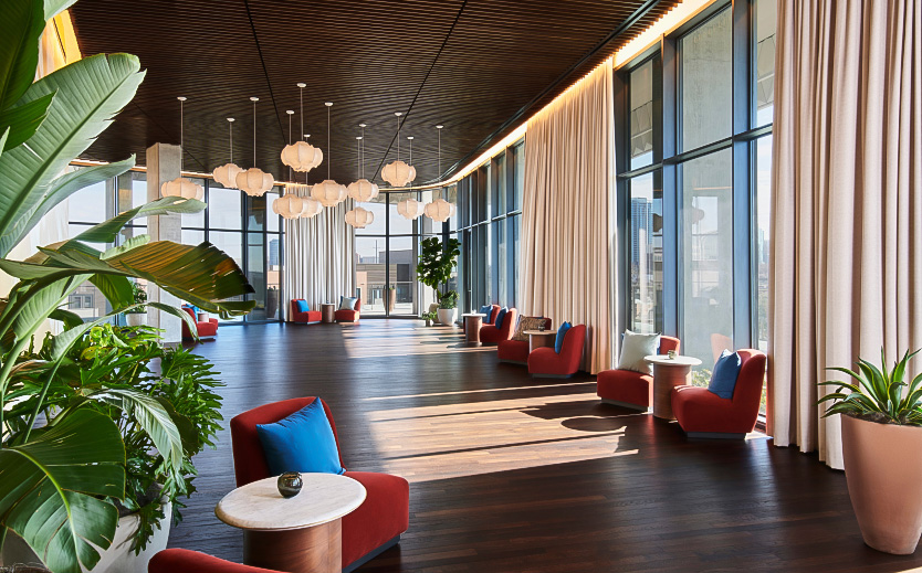 a room with chairs and tables