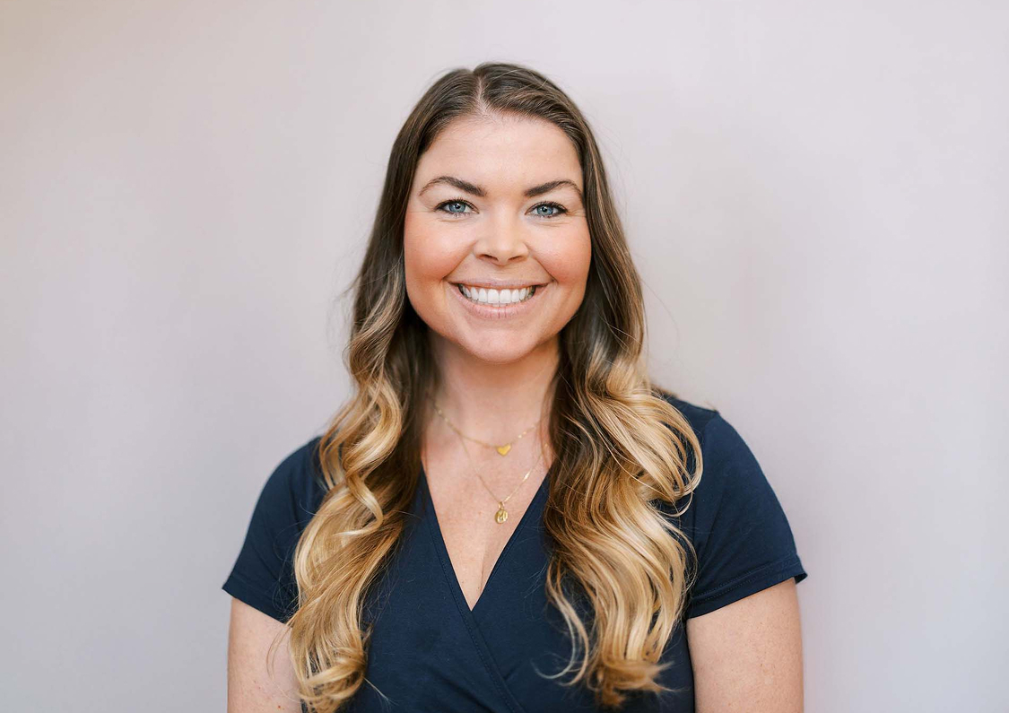 a woman smiling at camera