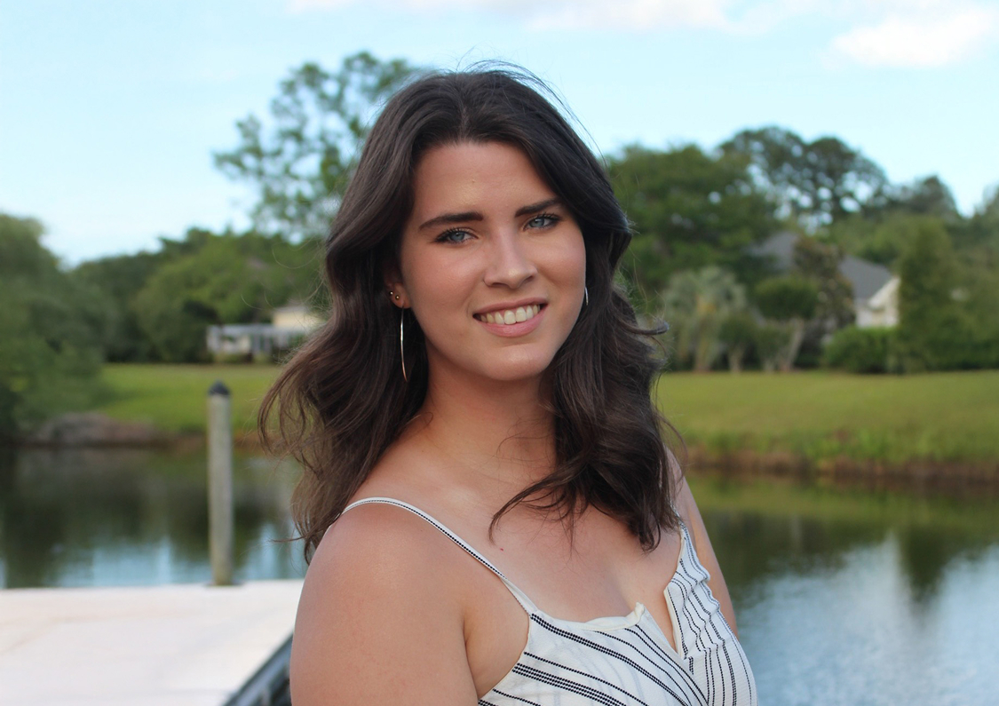 a woman smiling at camera