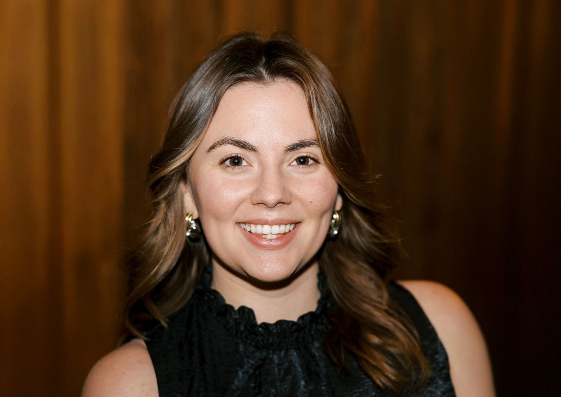 a woman smiling at camera