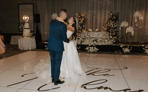 a man and woman dancing in a wedding dance