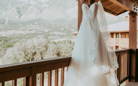 a wedding dress on a porch