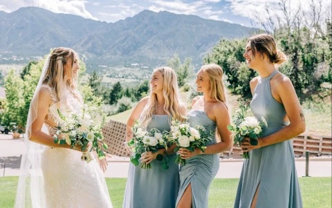 a group of women in dresses