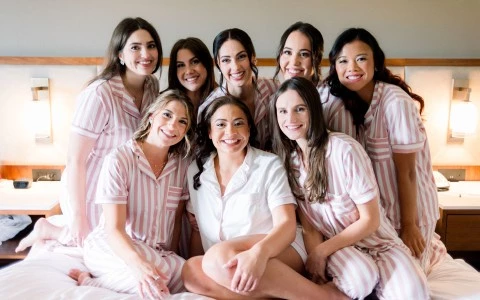 a group of women wearing matching pajamas