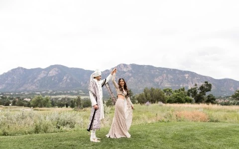 a man and woman in a field