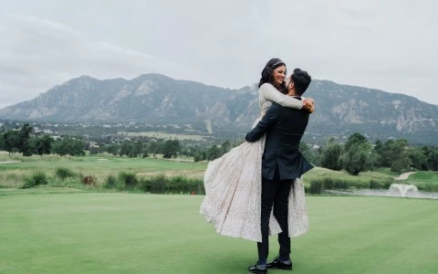 a man and woman holding each other