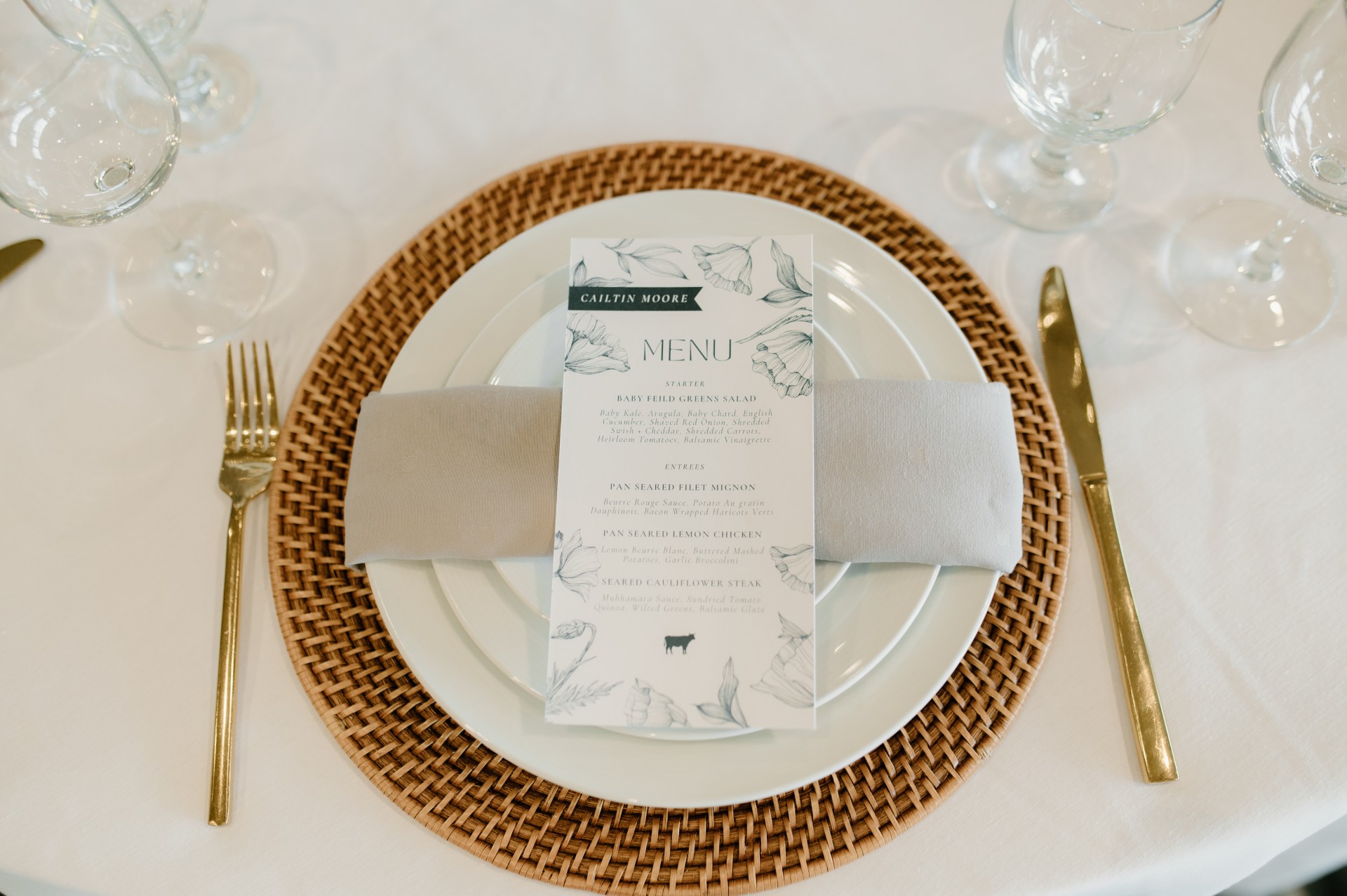 a place setting with a menu on a plate