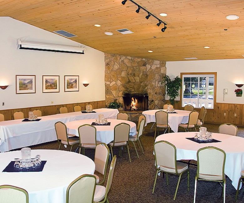 a room with tables and chairs