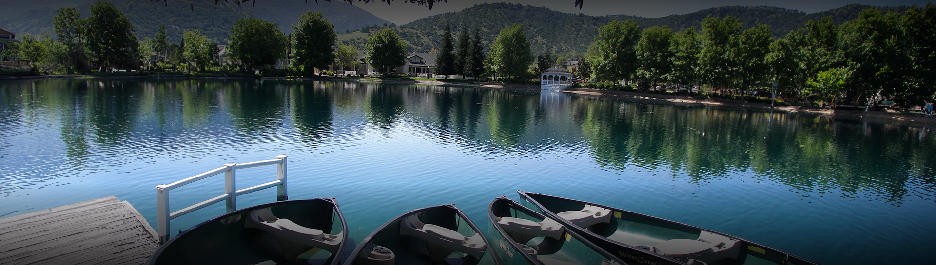 a group of boats on a lake